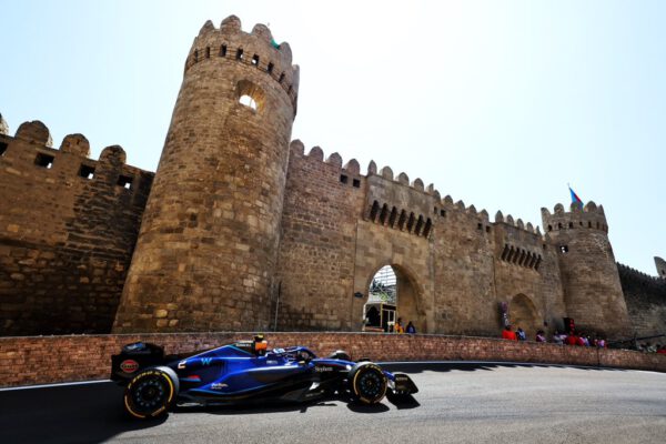 Logan Sargeant driving his Williams past the castle in Baku