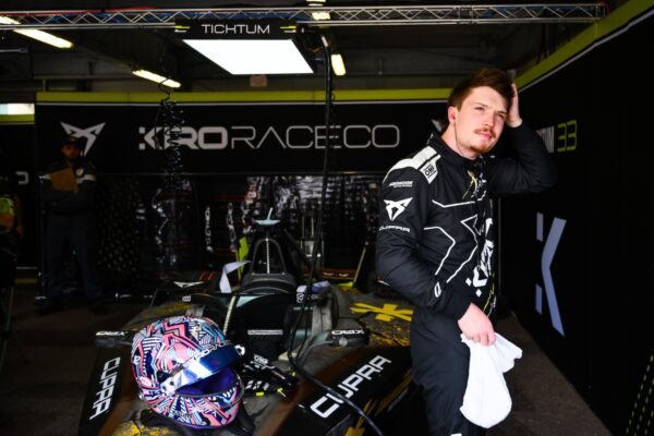 Dan Ticktum stading by his Cupra Kiro car, in the garage during the 2025 Monaco E-Prix