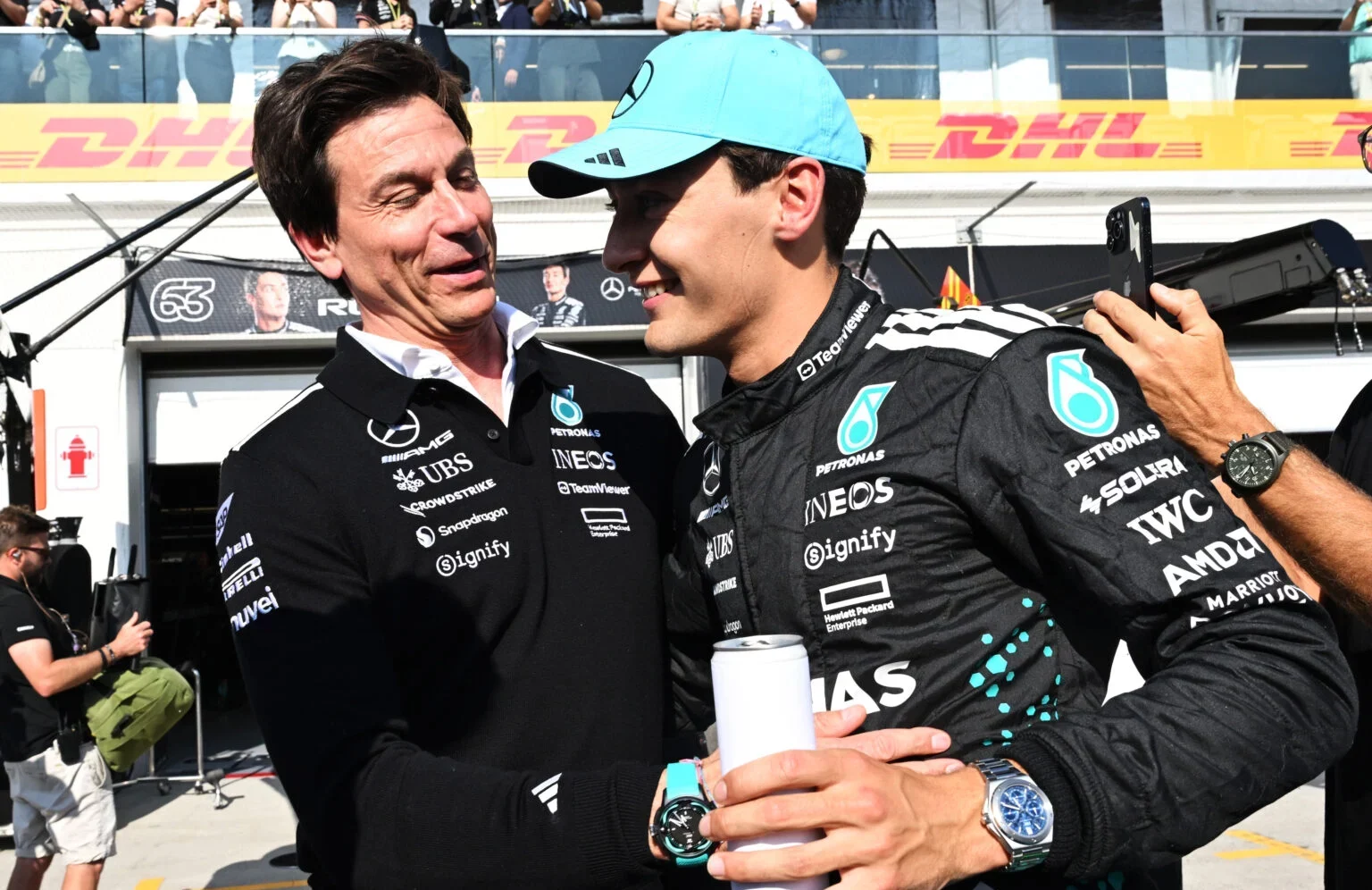 George Russell and Toto Wolff after the 2025 Canadian GP win