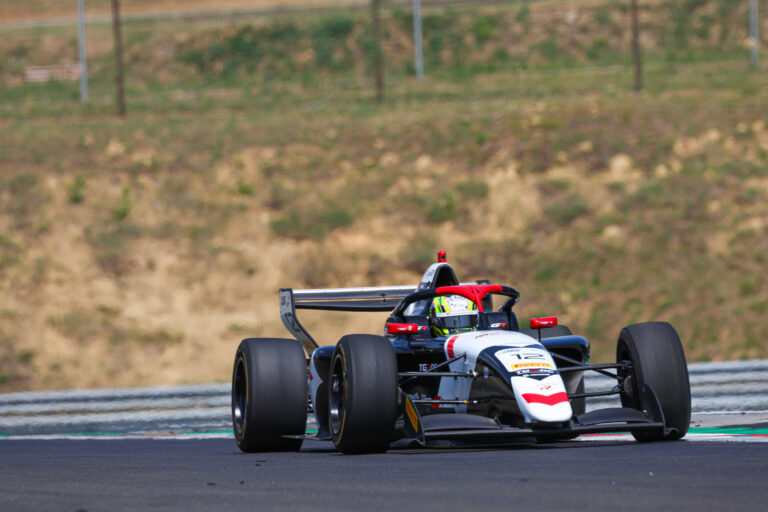 Yuki Sano and Reza Seewooruthun react after securing the front row for FREC Race 1 at the Hungaroring.
