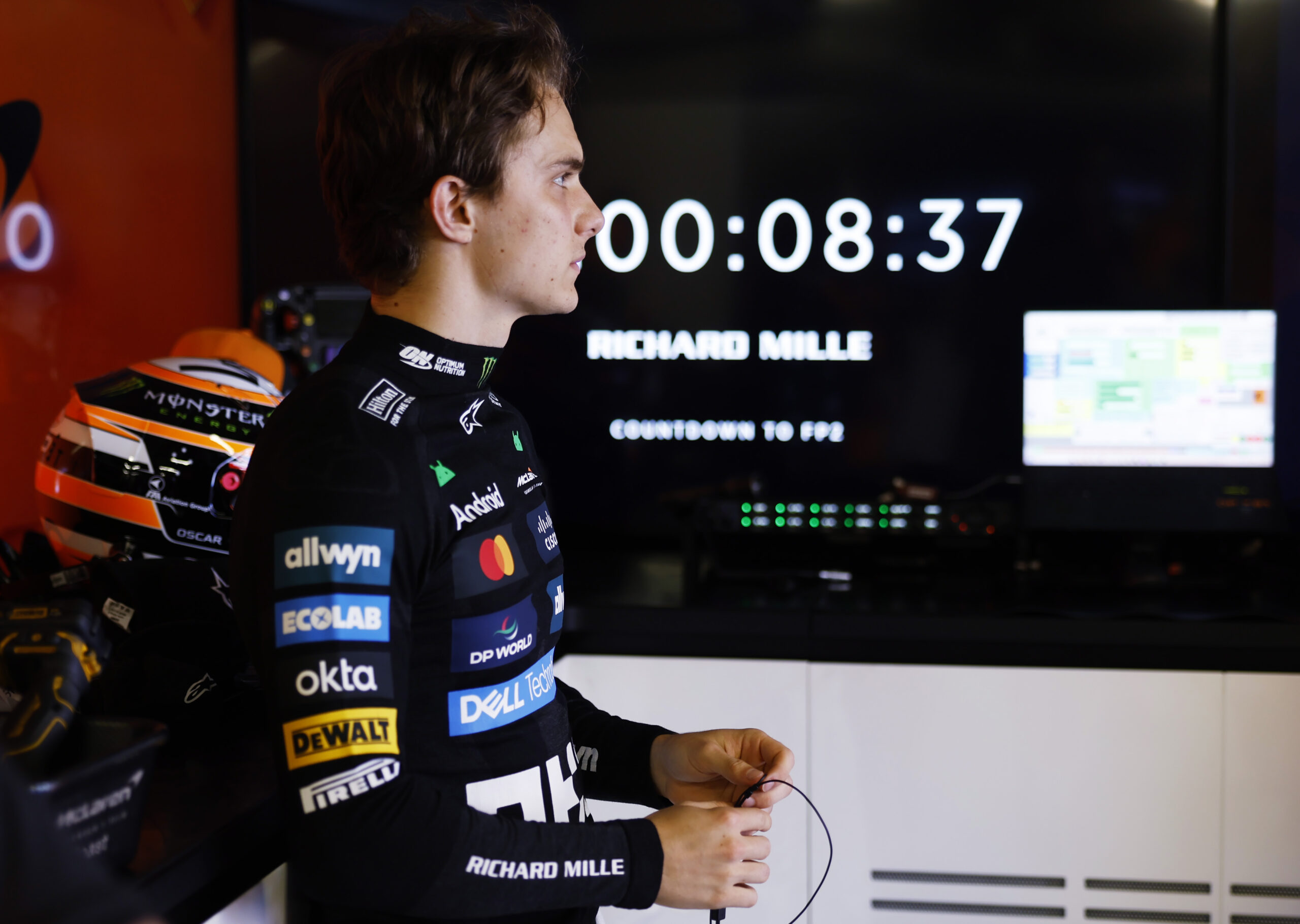 MONTE-CARLO, MONACO - MAY 23: Oscar Piastri of Australia and McLaren prepares to drive in the garage during practice ahead of the F1 Grand Prix of Monaco at Circuit de Monaco on May 23, 2025 in Monte-Carlo, Monaco. (Photo by Glenn Dunbar/LAT Images)