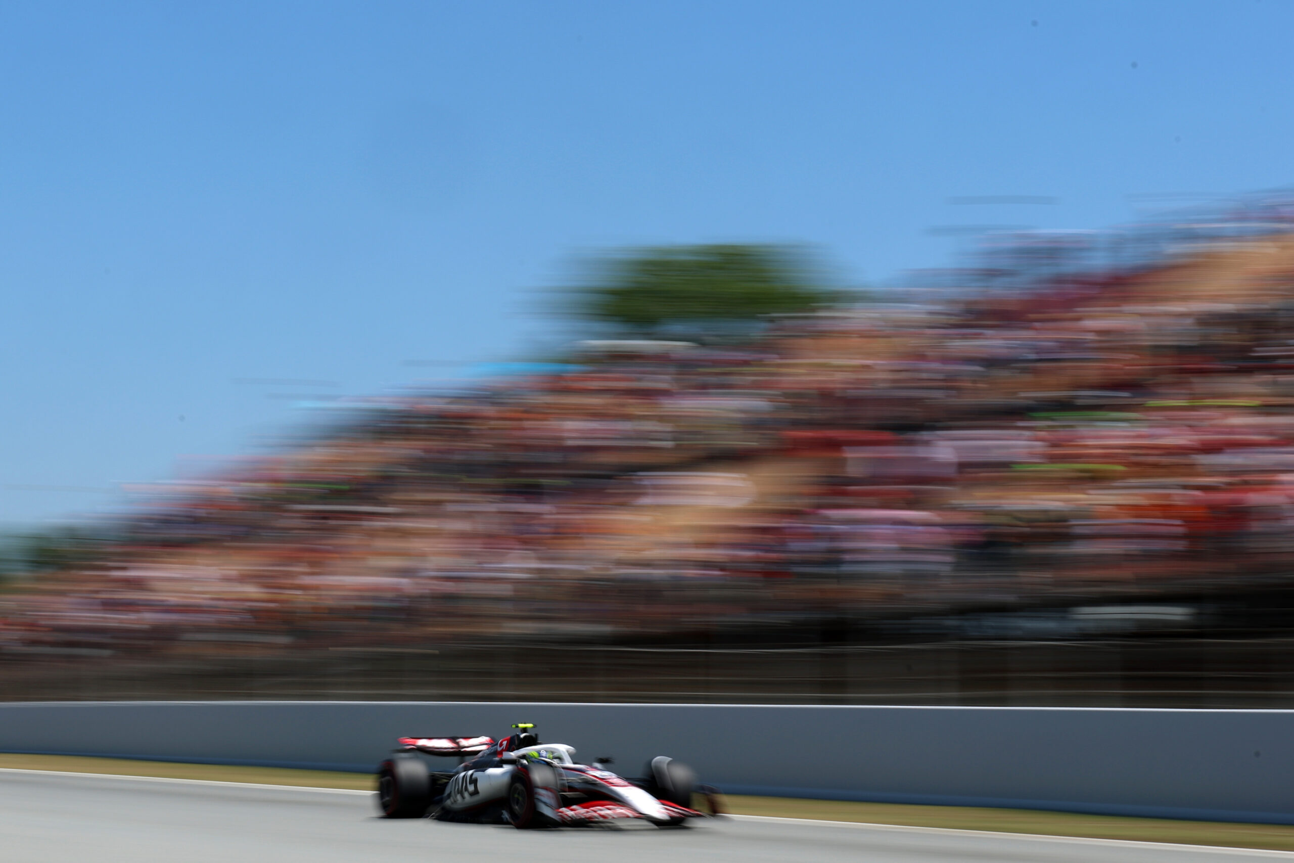 Haas faces tough 2025 Spanish GP after P15 and P17 in Qualifying; Bearman, Ocon eye strategy, tyre management for race recovery.