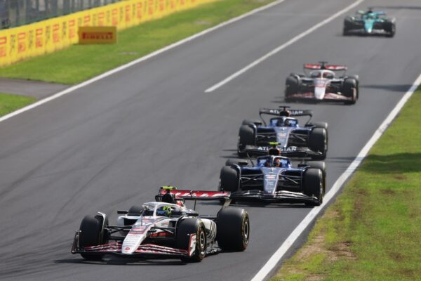 Oliver Bearman of Great Britain driving the (87) Haas F1 VF-25 Ferrari leads Carlos Sainz of Spain driving the (55) Williams FW47 Mercedes and Alexander Albon of Thailand driving the (23) Williams FW47 Mercedes on track during the F1 Grand Prix of Italy at Autodromo Nazionale Monza.