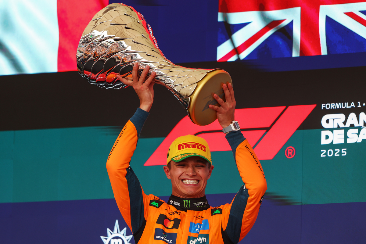 SAO PAULO, BRAZIL - NOVEMBER 09: Race winner Lando Norris of Great Britain and McLaren lifts his trophy on the podium during the F1 Grand Prix of Brazil at Autodromo Jose Carlos Pace on November 09, 2025 in Sao Paulo, Brazil.