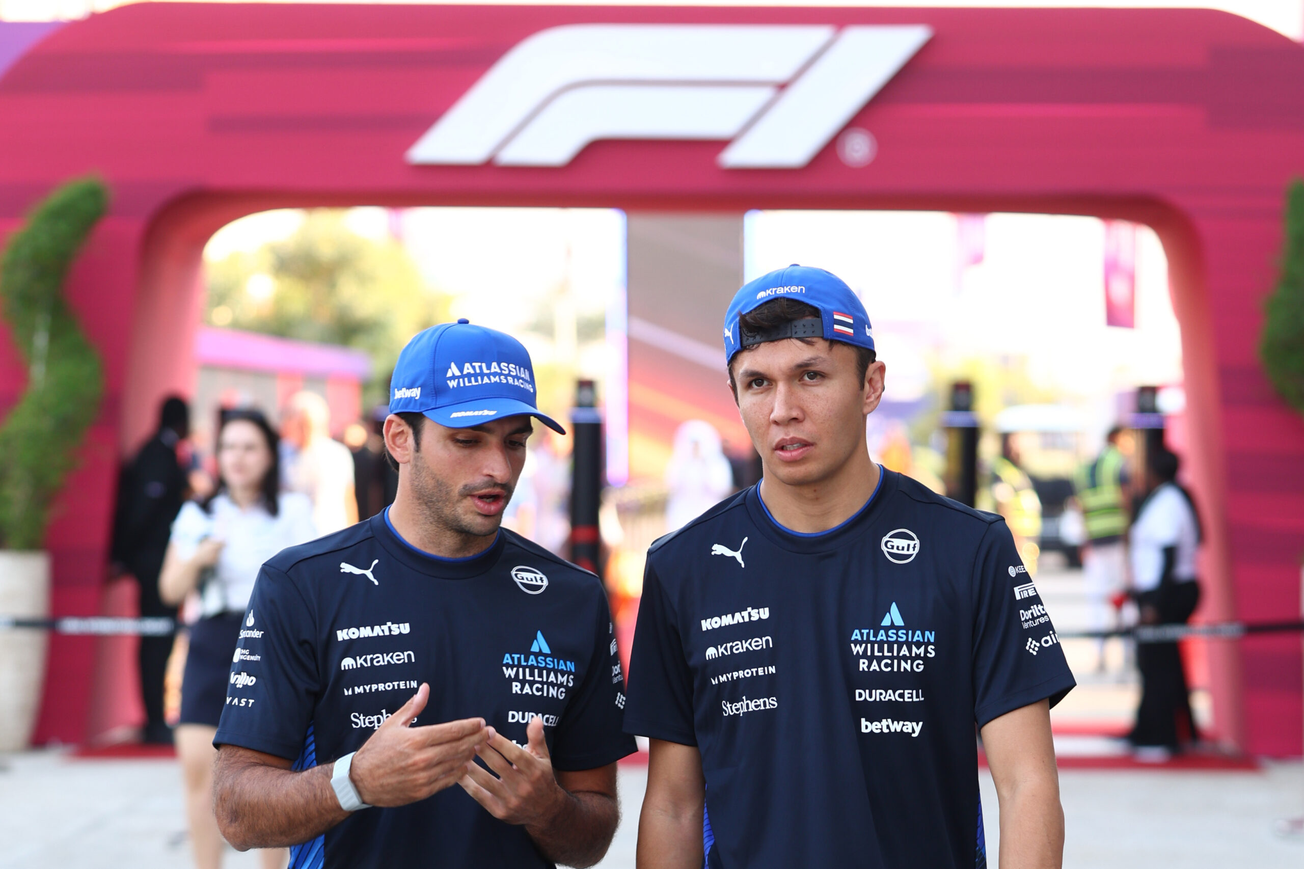 Carlos Sainz and Alexander Albon walk in the Paddock ahead of the F1 Grand Prix of Qatar.