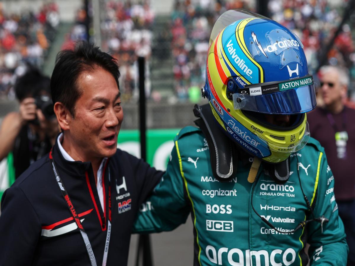 Aston Martin F1 driver Fernando Alonso and Koji Watanabe, the President of Honda Racing Corporation (HRC) at the 2026 Japanese GP, Suzuka