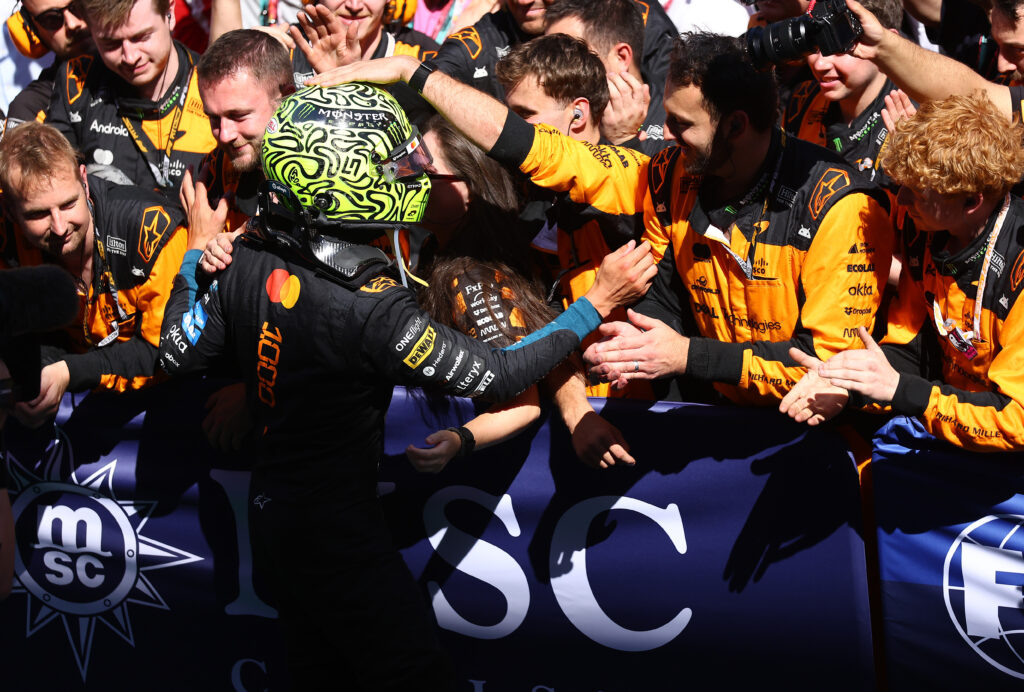 Lando Norris and McLaren celebrates with his team in parc ferme during the F1 Grand Prix of Barcelona-Catalunya.