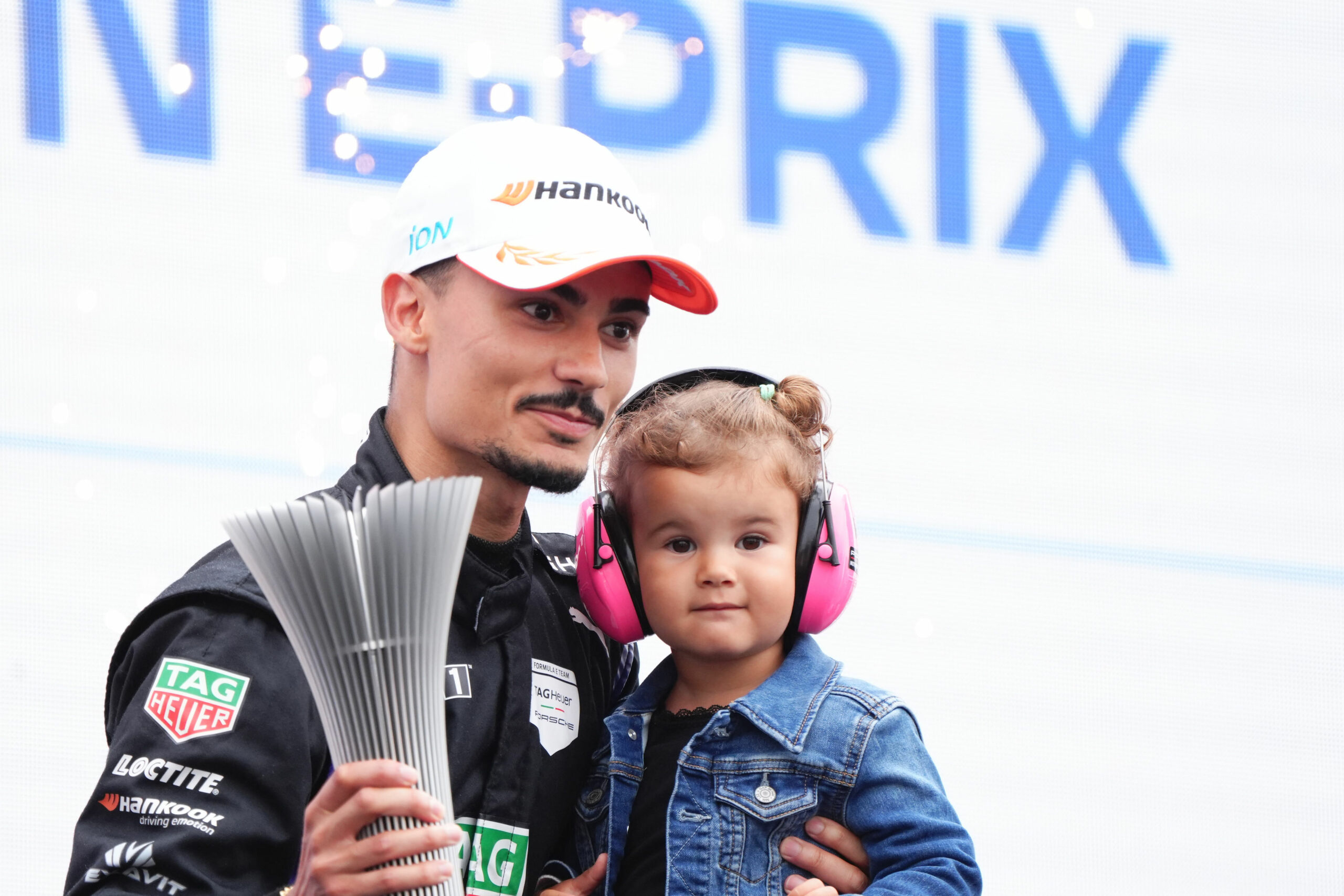 Formula E TAG Heuer Porsche driver Pascal Wehrlein and his daughter after Race 1 of the Berlin E-Prix