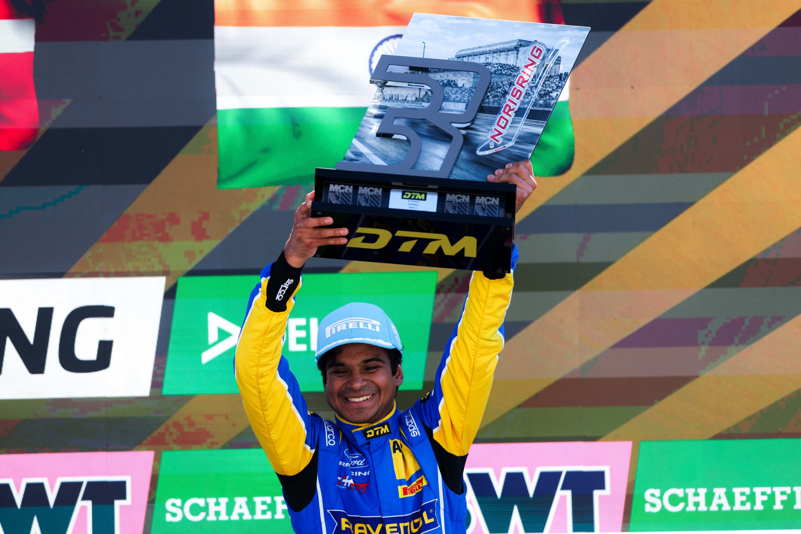 Arjun Maini reflects on his first 2026 DTM podium with Ford, a chaotic Norisring Race 1, and why bold moves require full commitment.