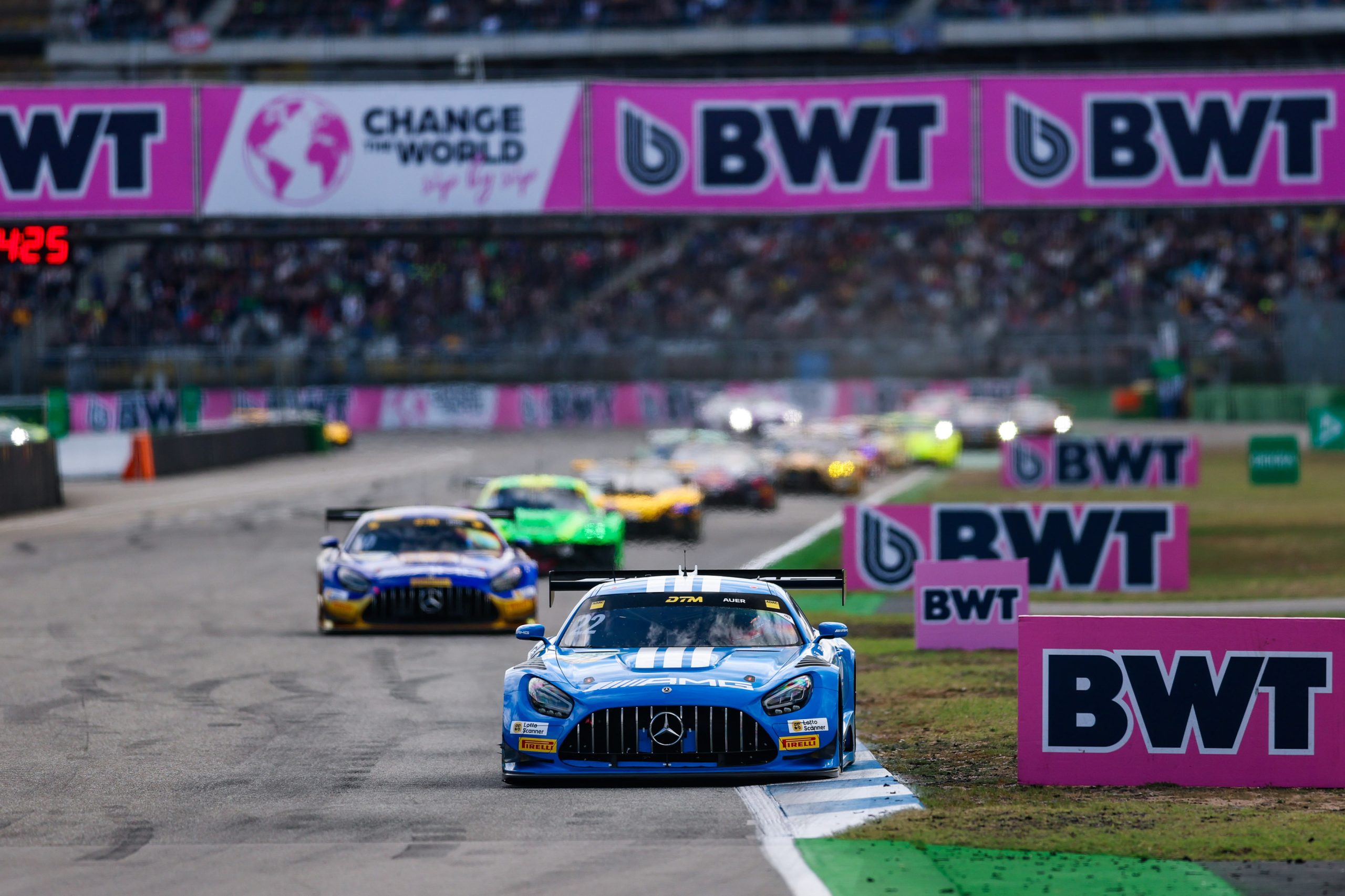 Auer wins DTM Race 1 at the Hockenheimring after a dramatic crash and pit stop chaos, as the championship battle heads into Sunday's finale.