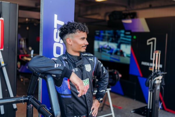 Pascal Wehrlein standing outside his Porsche garage during the 2025 Monaco E-Prix