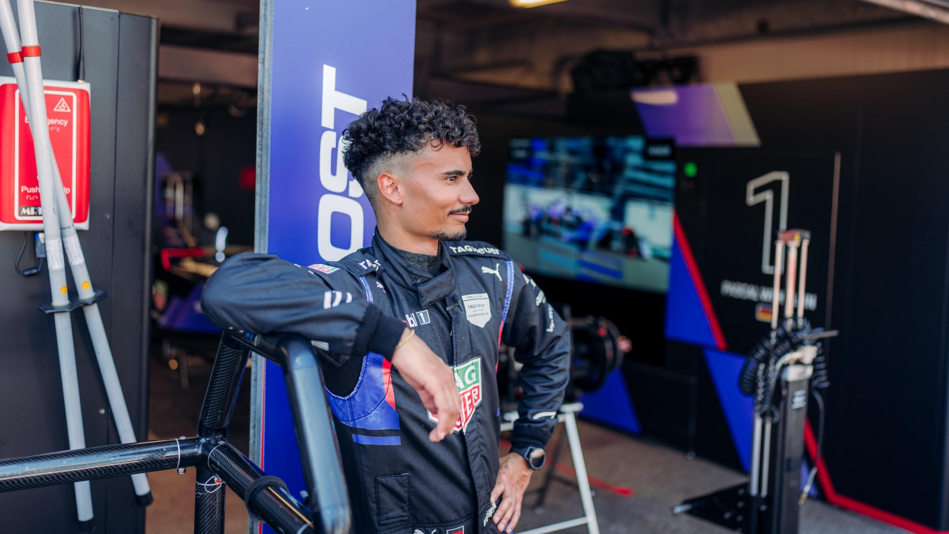 Pascal Wehrlein standing outside his Porsche garage during the 2025 Monaco E-Prix