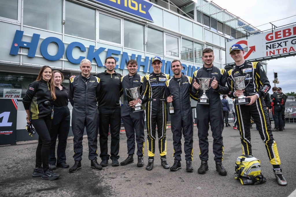 Emson and Lebbon extend their 2026 GT Open lead to 23 points after a wet Hockenheim win, as Moncini and Testa claim a maiden victory.