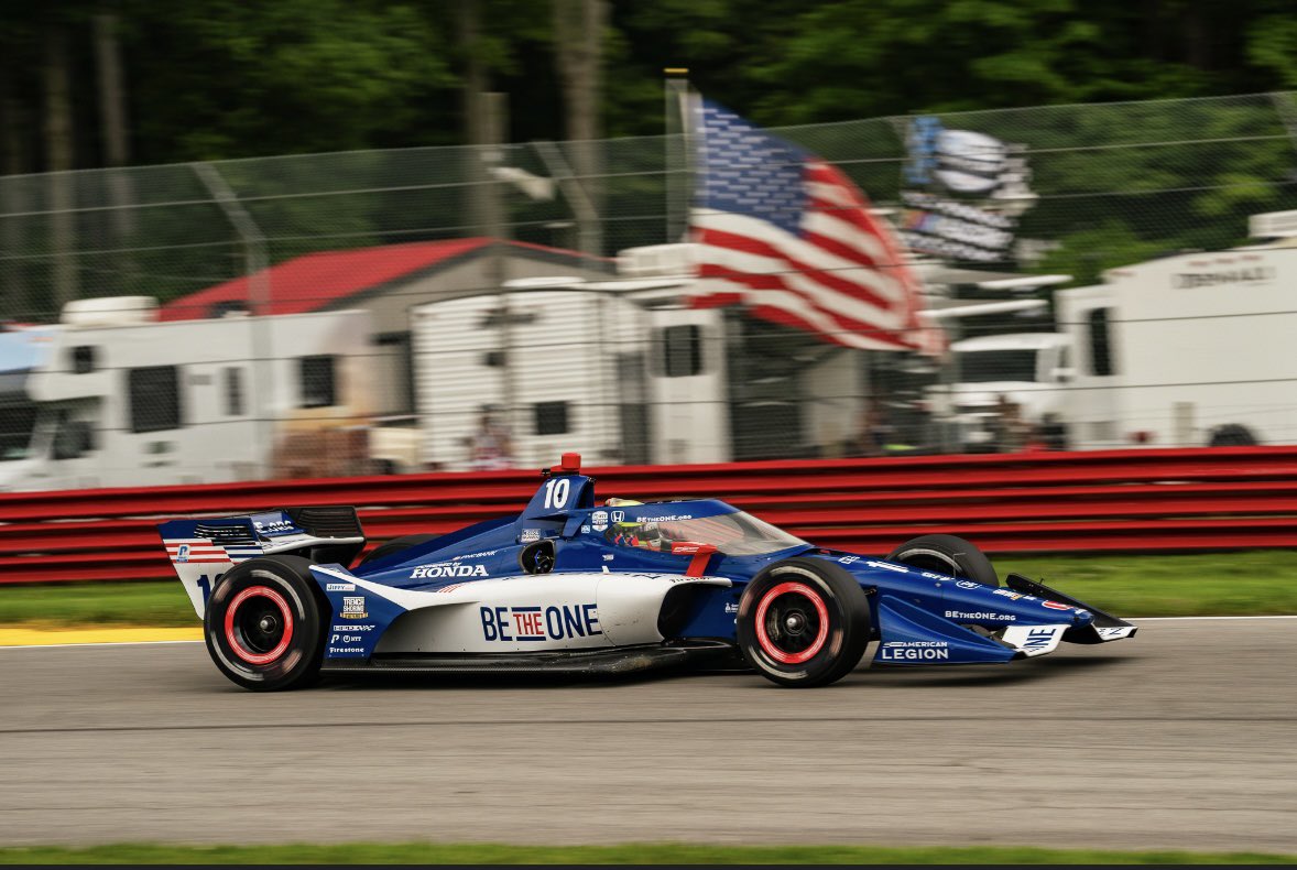 Alex Palou driving his blue and white number 10 Chip Ganassi Racing car