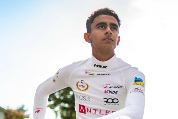 Akshay Bohra sitting on his R-ace GP FRECA car, pictured during the preview of the Austria round of the 2025 FRECA season
