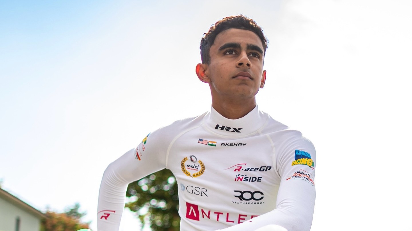 Akshay Bohra sitting on his R-ace GP FRECA car, pictured during the preview of the Austria round of the 2025 FRECA season