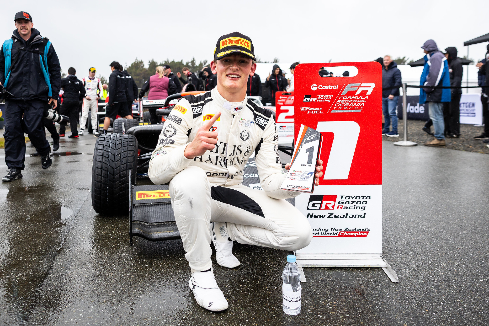 Freddie Slater claims his first 2026 CTFROT win at Teretonga, mastering wet conditions and safety car restarts in Race 1.
