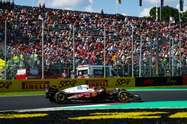 Charles Leclerc driving by Tifosi in Monza at the Italian GP