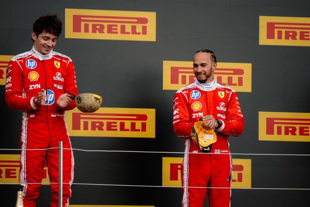 How have Scuderia Ferrari and drivers Lewis Hamilton and Charles Leclerc fared in Pit Debrief's mid-season F1 review in 2026?