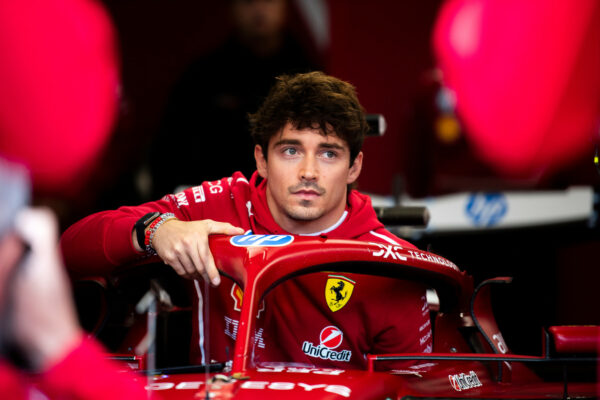 Leclerc getting into his Ferrari at the Belgian GP
