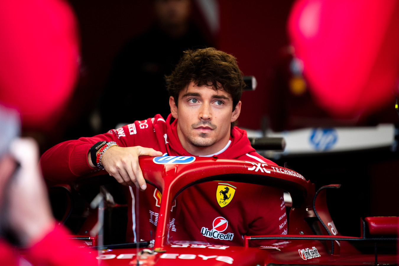 Leclerc getting into his Ferrari at the Belgian GP
