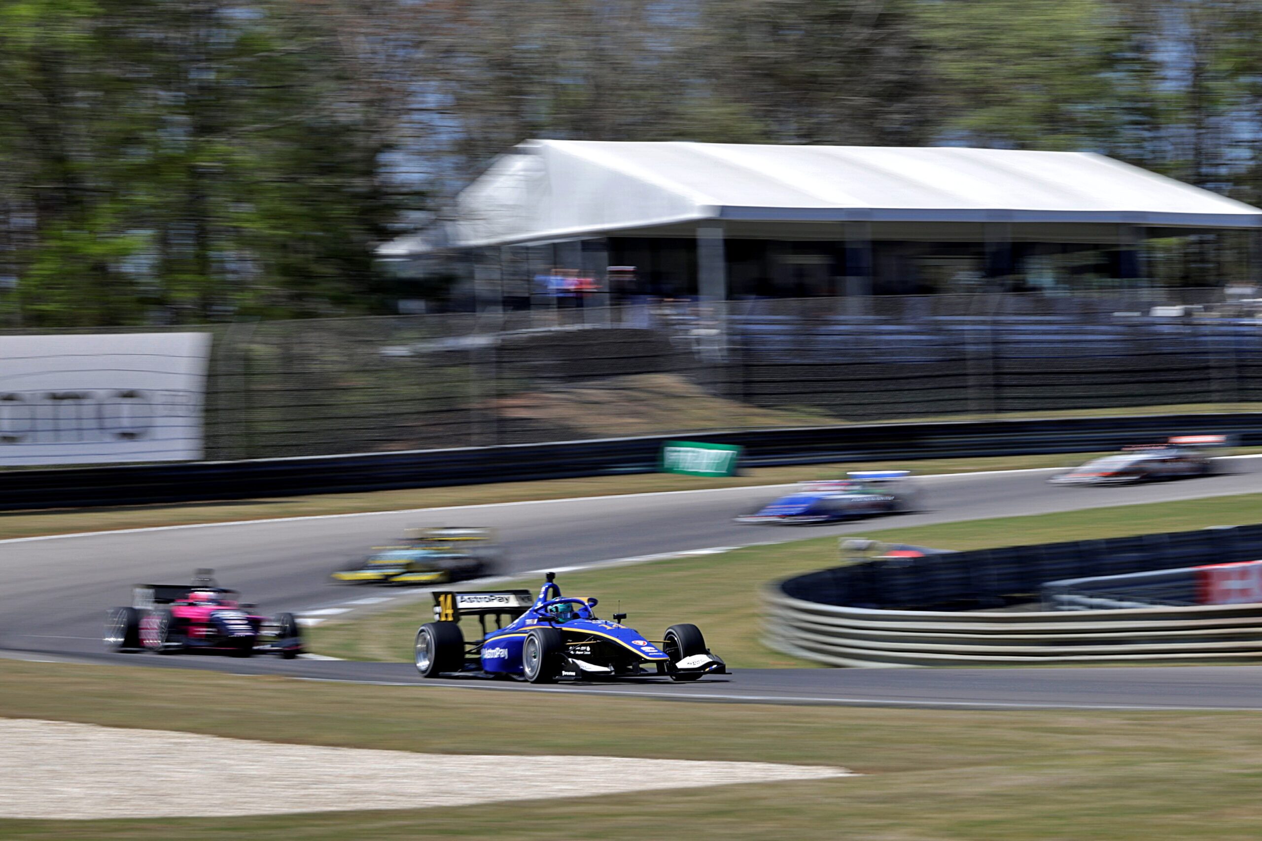 Indy NXT Race 2 Barber, Alessandro de Tullio and Max Taylor battle for first.