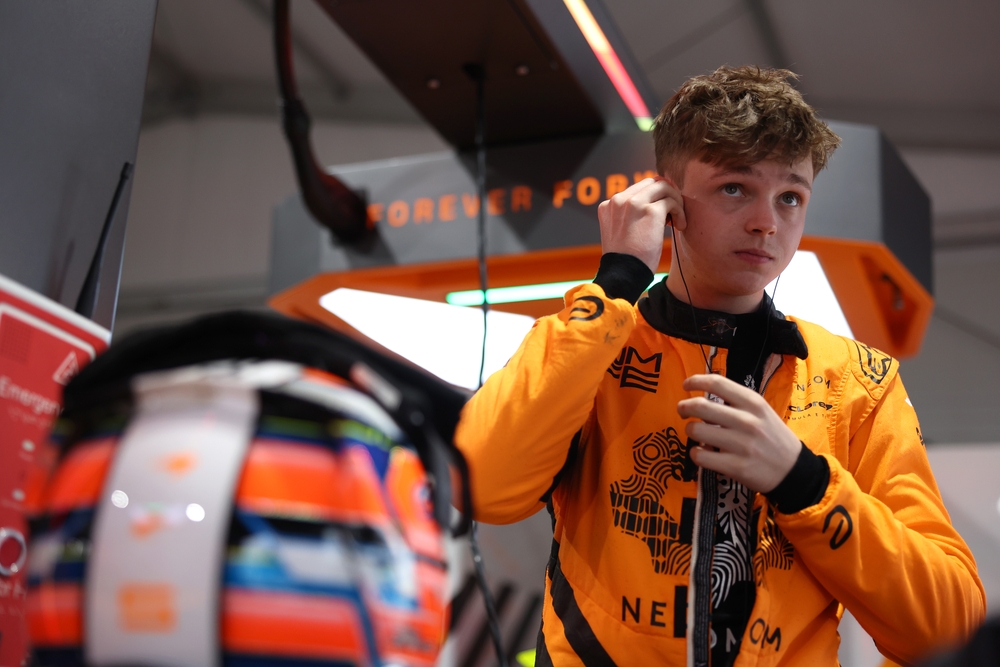 BERLIN, GERMANY - JULY 13: Taylor Barnard of Great Britain and NEOM McLaren Formula E Team prepares to drive in the garage during practice, ahead of the Berlin E-Prix, Round 14 of the 2025 FIA Formula E World Championship at Tempelhof Airport Circuit on July 13, 2025 in Berlin, Germany.