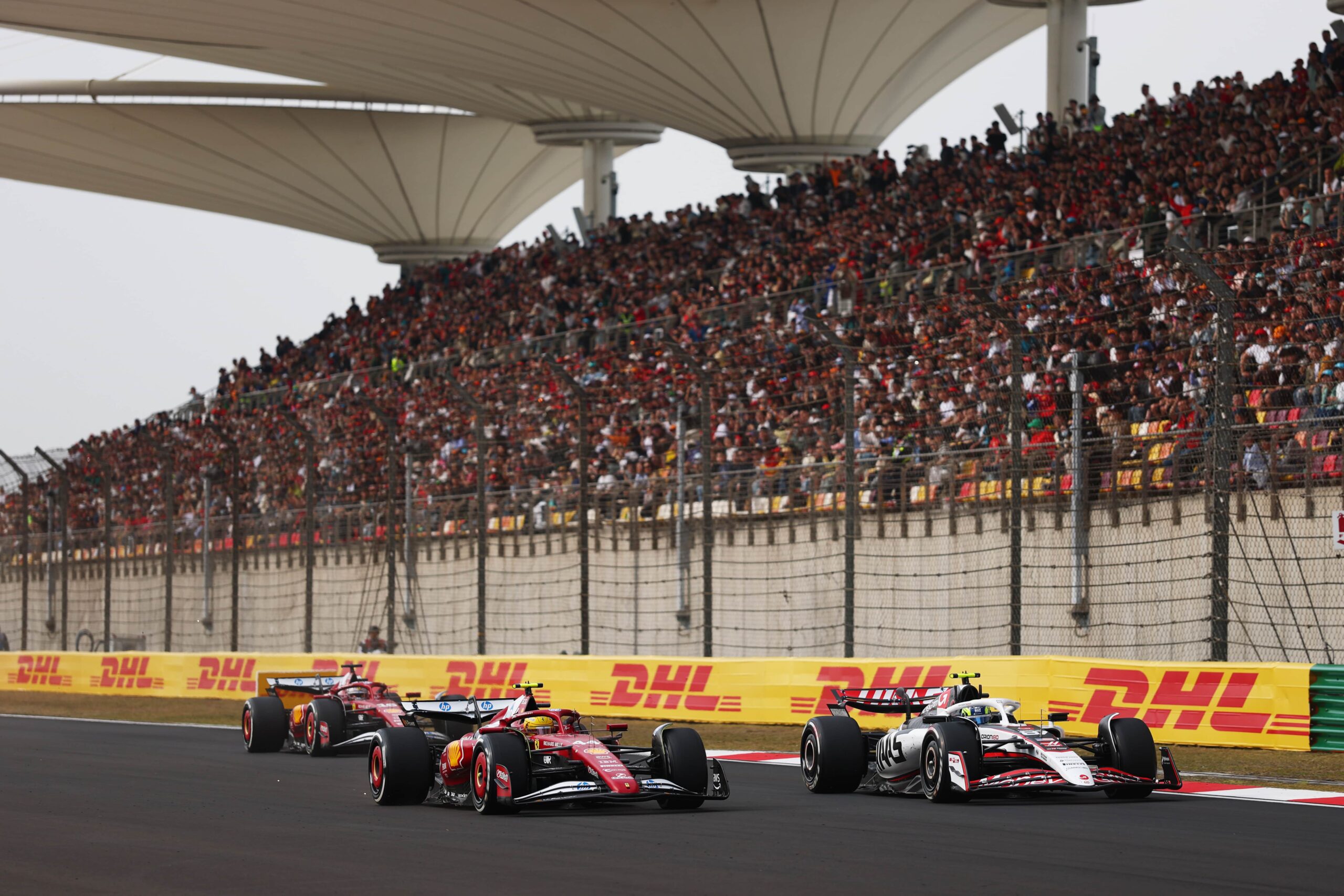 F1 Bearman battles both Ferraris at the 2025 Chinese Grand Prix