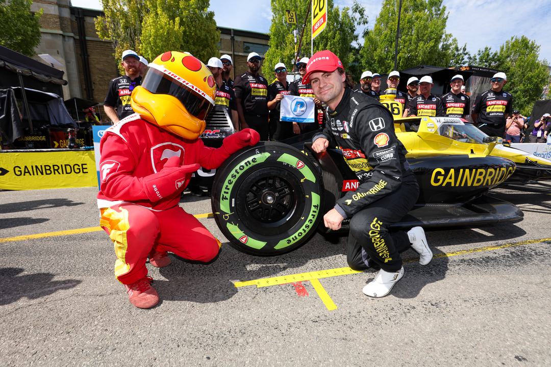 Colton Herta and Firehawk after winning pole at the Ontario Honda Dealers Indy Toronto