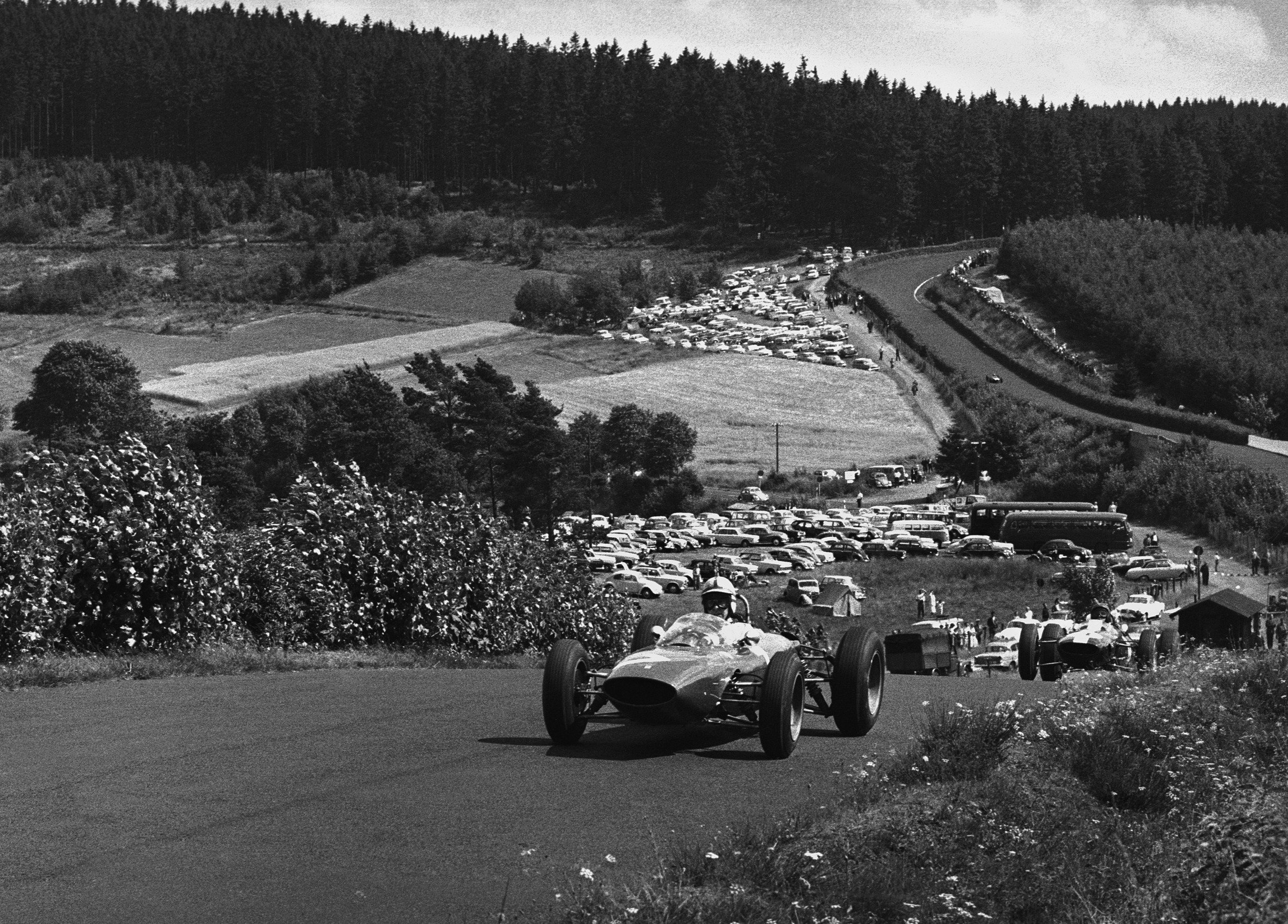 John Surtees leads Jim Clark on his way to a maiden Formula 1 victory at the 1963 F1 German Grand Prix