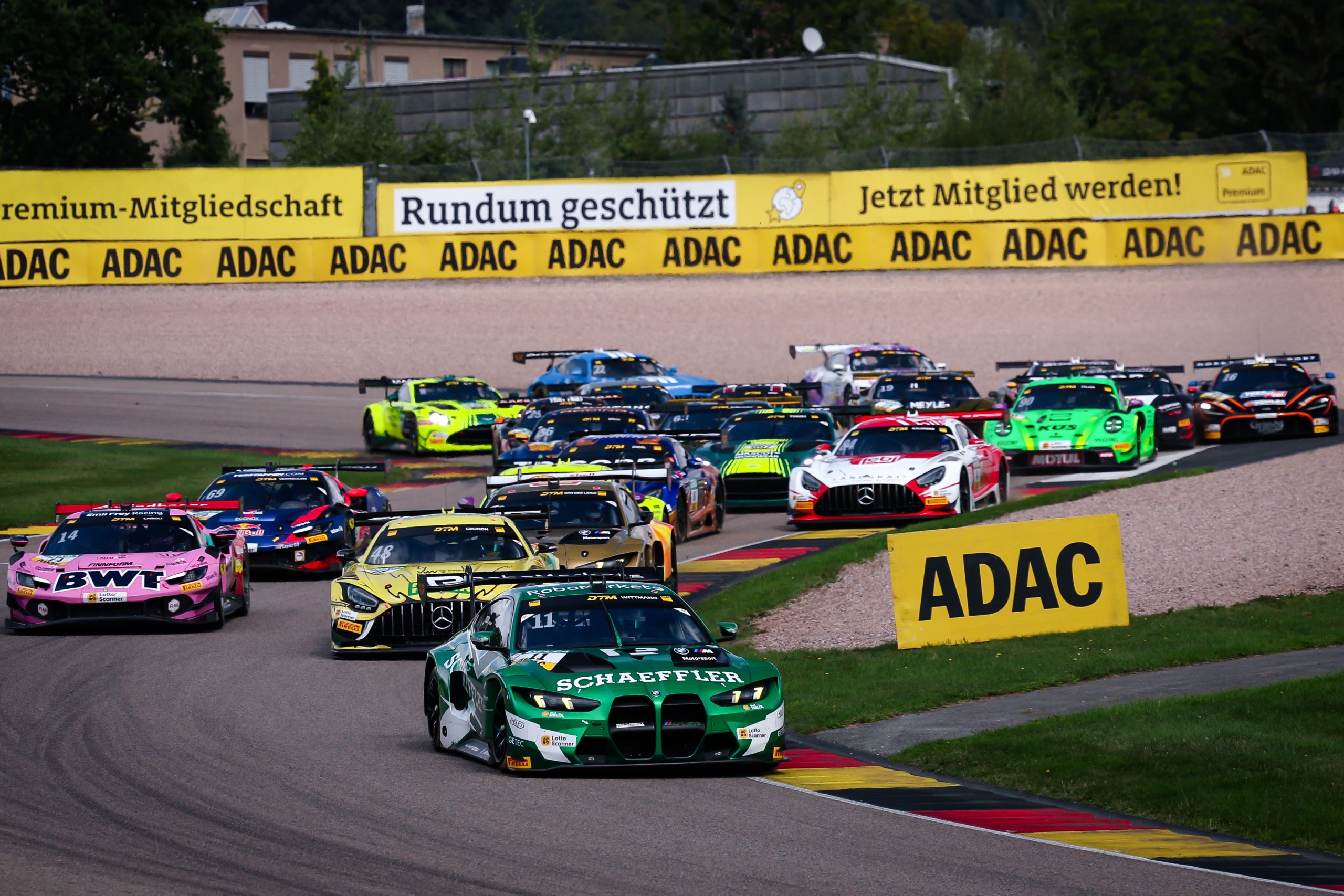 Marco Wittmann wins DTM Race 1 at the Sachsenring as Thomas Preining takes the championship lead ahead of the season finale.