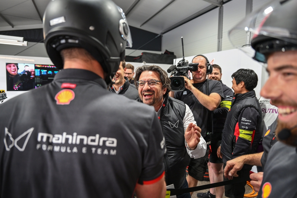 Mahindra Racing Team Principal Frederic Bertrand celebrating with team