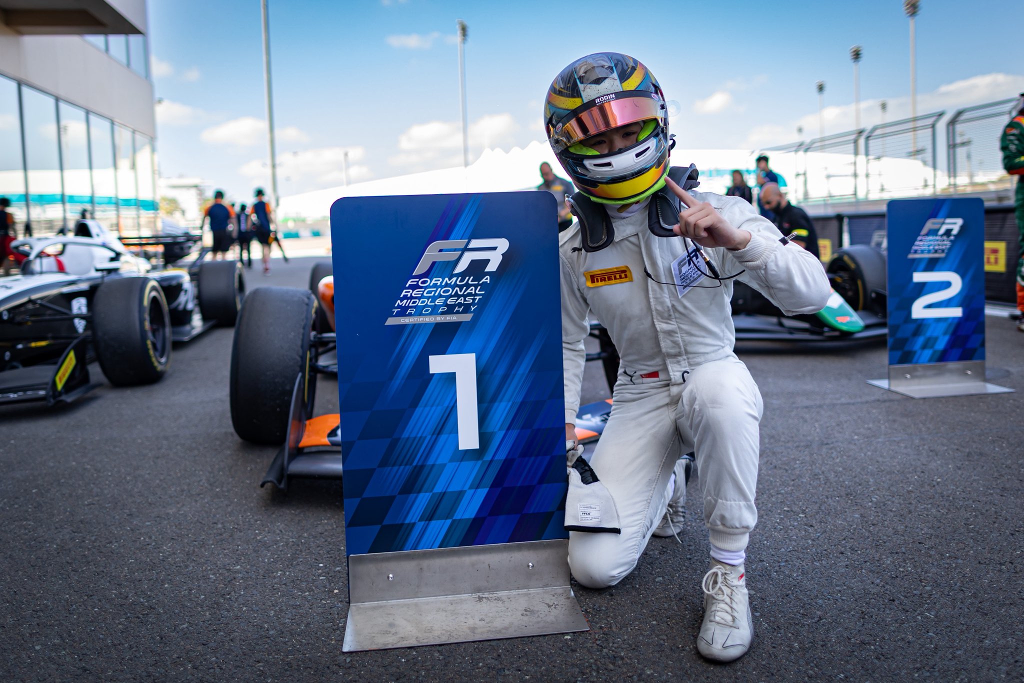 Christian Ho wins a dramatic 2026 FRME Trophy Race 2 at Yas Marina after Safety Cars, penalties and late-race battles.
