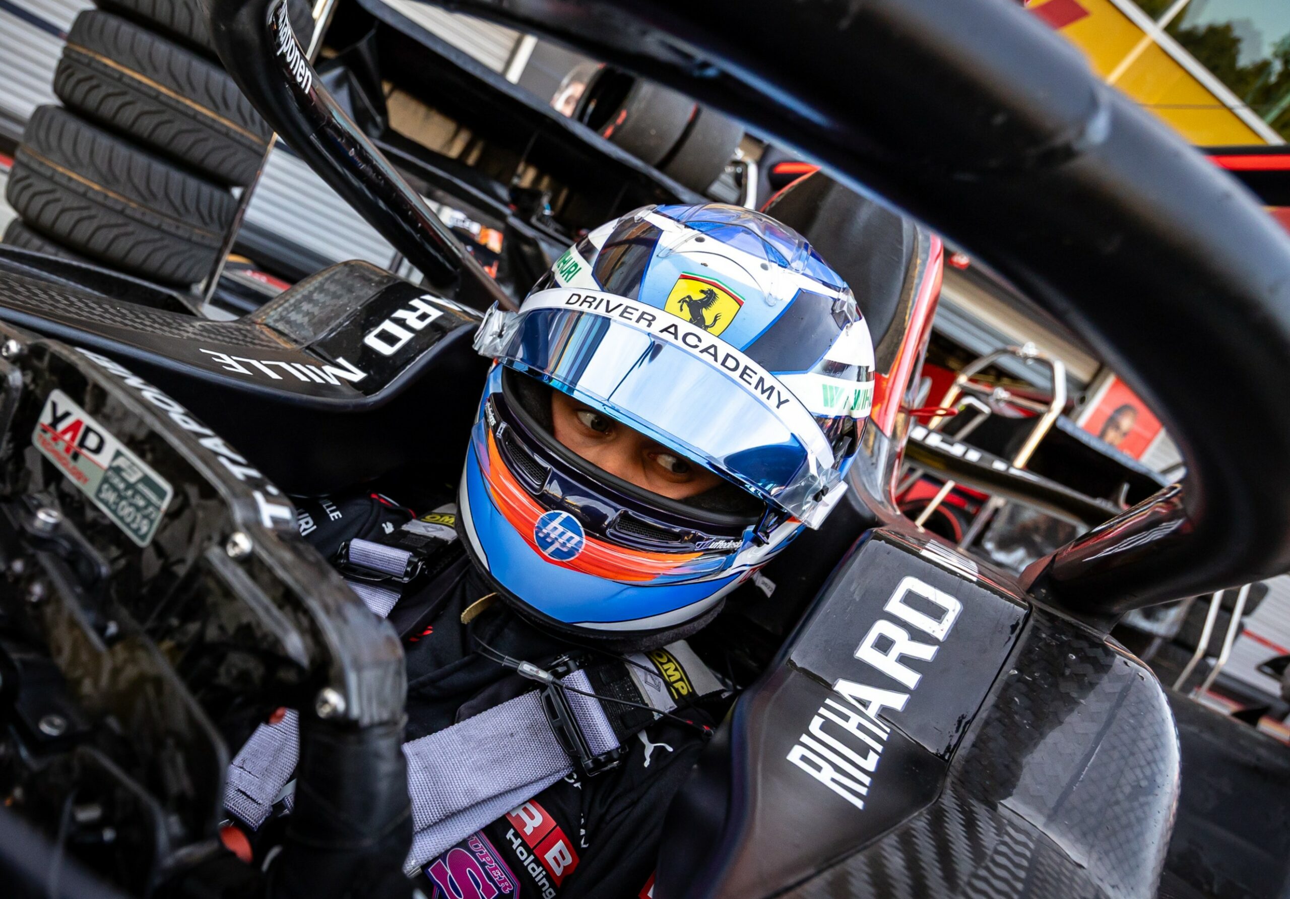 Tuukka Taponen in his MP Motorsport car, showcasing his F3 2025 helmet