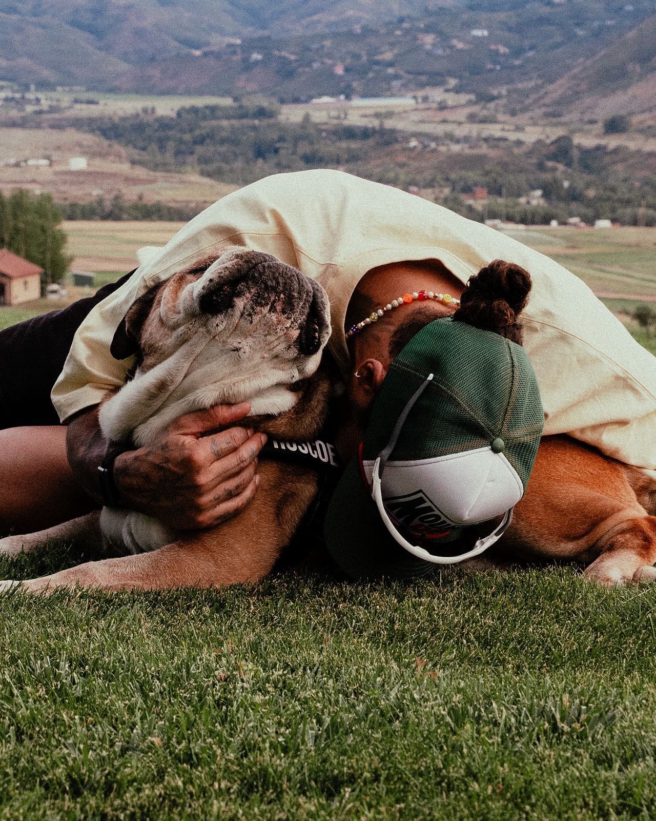 7 time world champion, Lewis Hamilton with his late pet dog, Roscoe