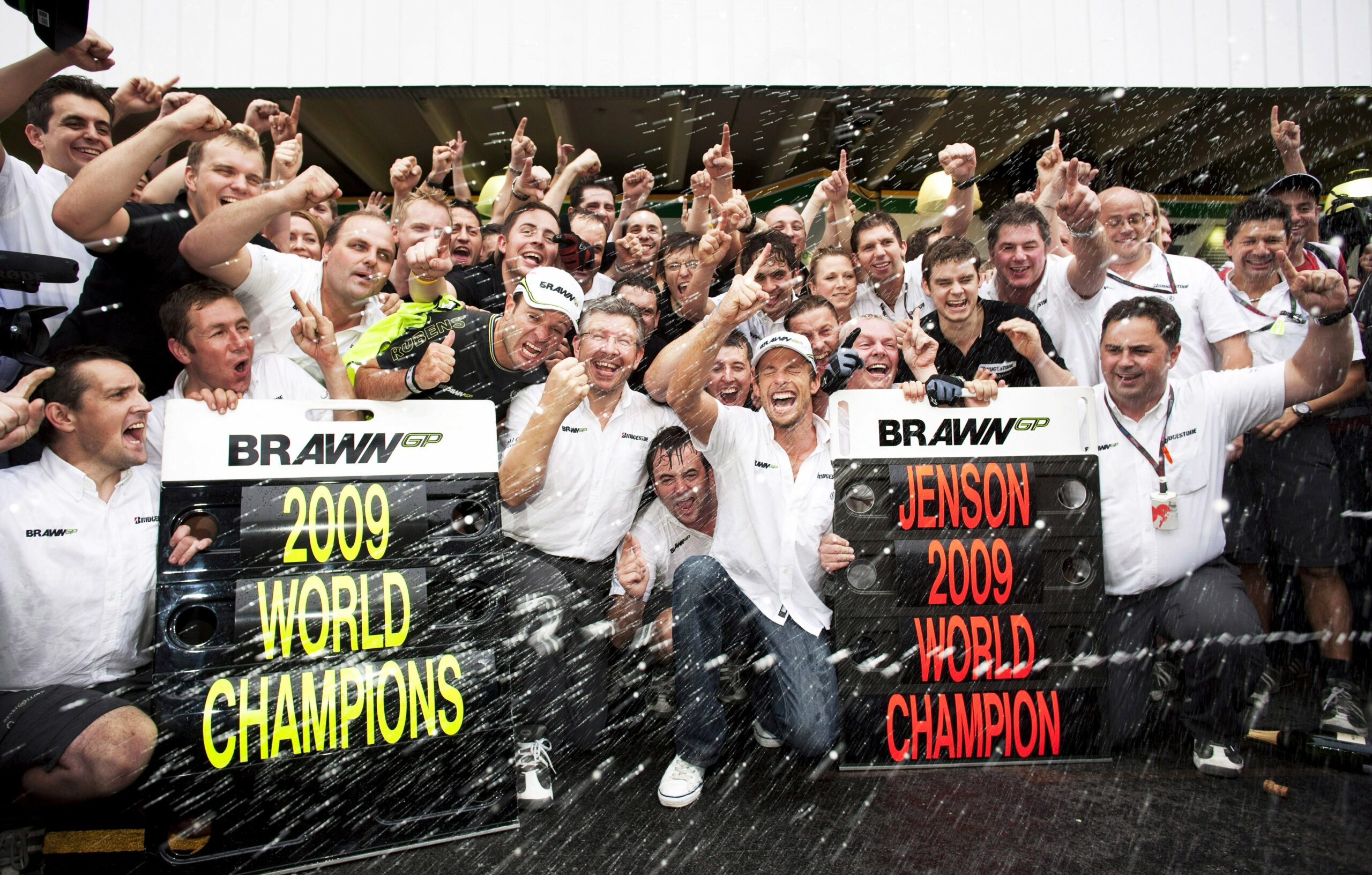 Jenson Button and Brawn GP celebrate after securing the Formula 1 World Drivers' and World Constructors' Championships at the 2009 F1 Brazilian Grand Prix.