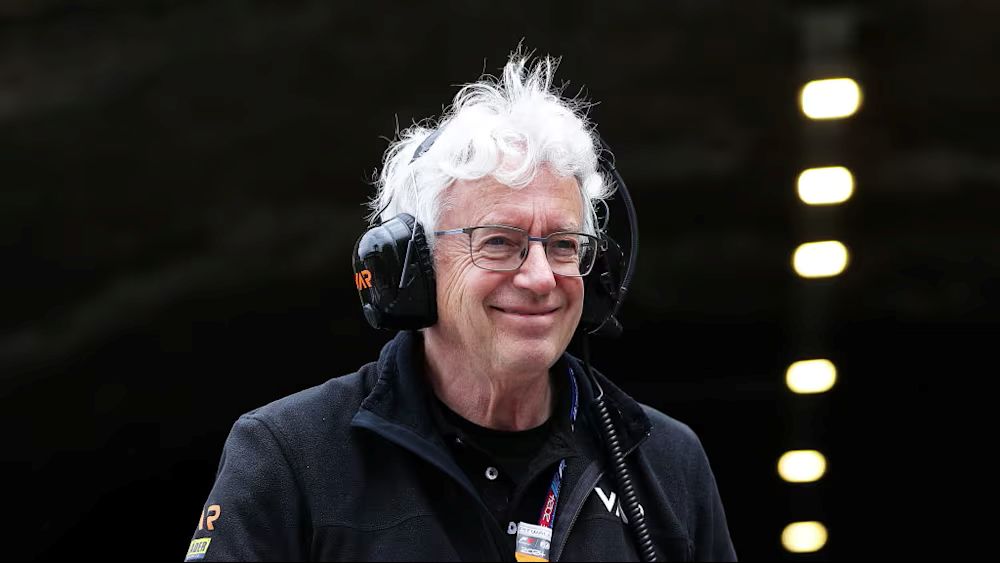 Frits Van Amersfoort on his team celebrating 50 years