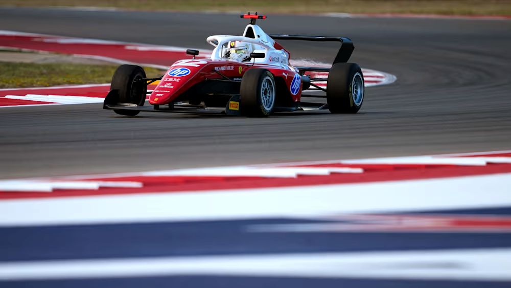 Larsen receives a three-place grid penalty after stewards blame her for the Palmowski collision in the 2026 F1 Academy Austin race.