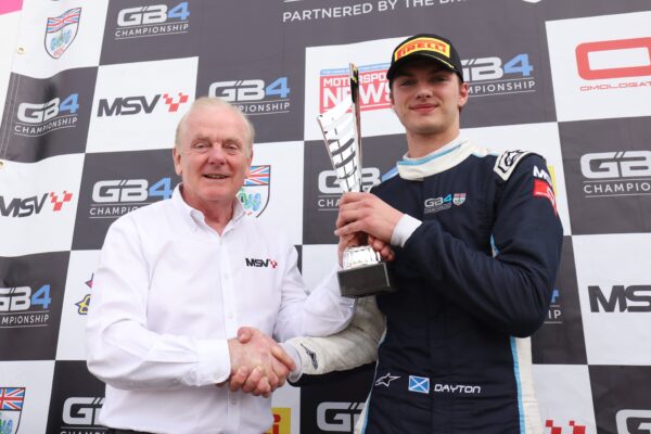 Coulthard reflects on his Silverstone GB4 win, revealing how a bold move and race interruptions shaped his victory.