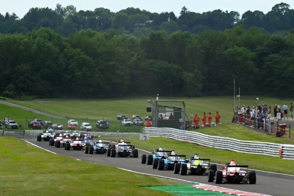 Fred Green held off Alex O’Grady at Oulton Park to win GB4 Race 1, extending his 2026 Championship lead after a tense battle.