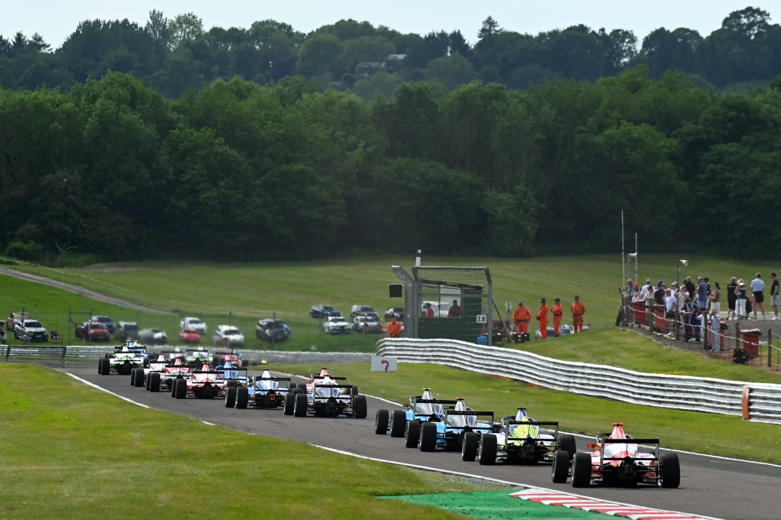 Fred Green held off Alex O’Grady at Oulton Park to win GB4 Race 1, extending his 2026 Championship lead after a tense battle.