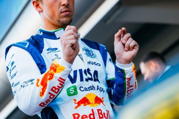 Liam Lawson, VCARB Formula 1 driver, pictured in the paddock during the 2026 F1 season, focused before a session.