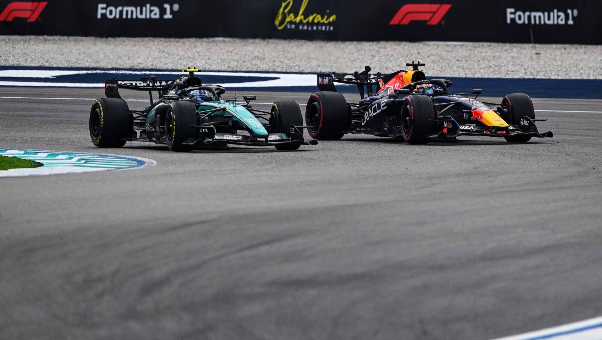 Max Verstappen of Red Bull Racing wins the 2025 F1 Race in Malaysia after a long delay for rain and rain-related issues.