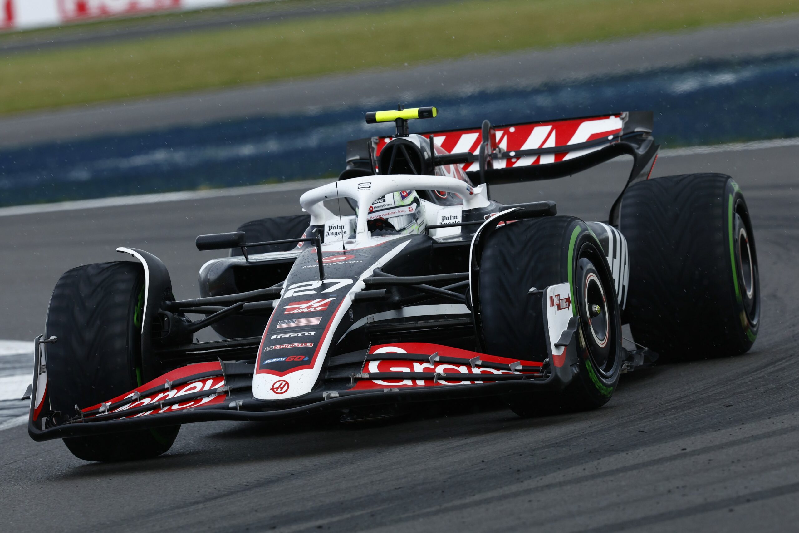 Nico Hulkenberg driving in the rain at Silverstone