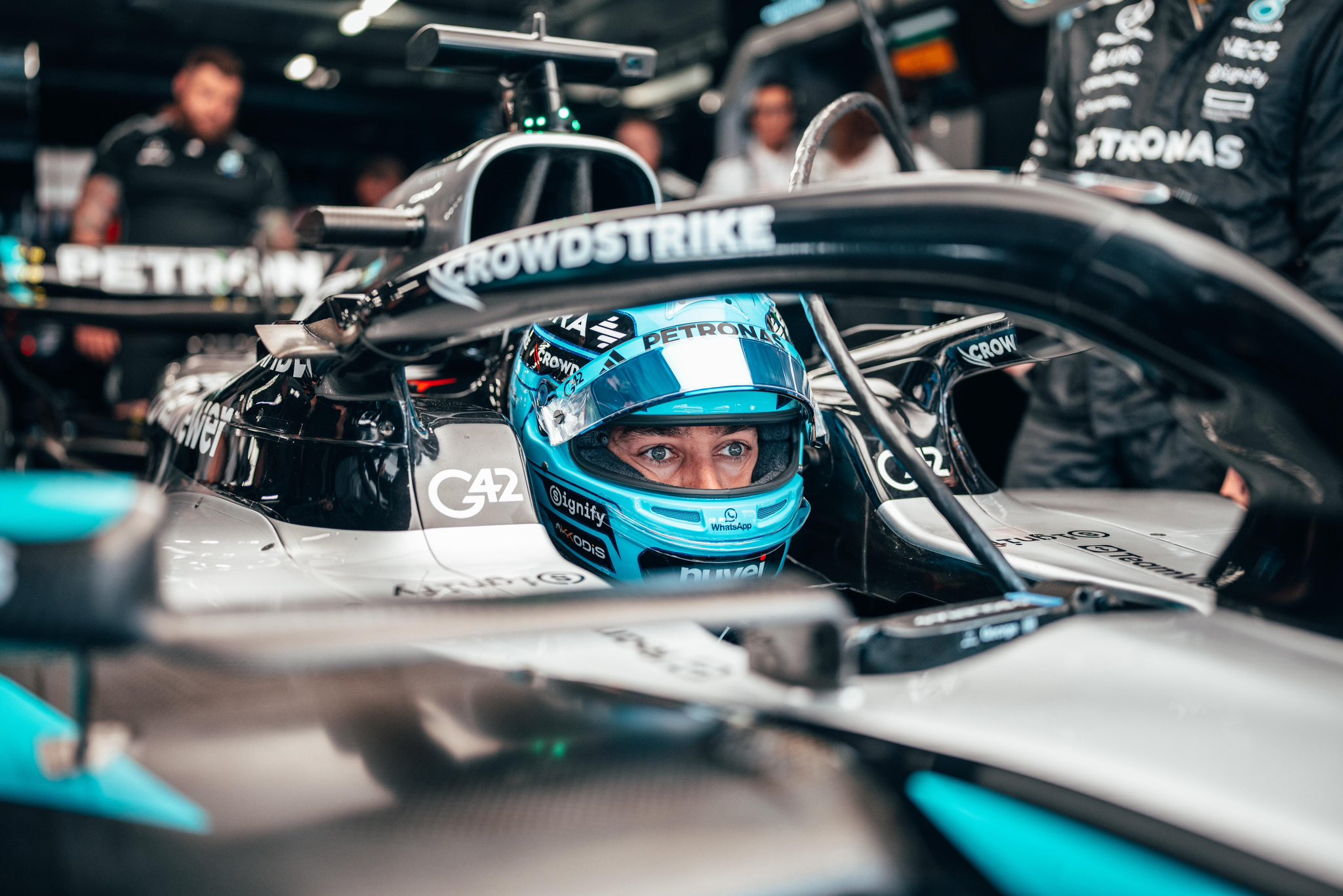 George Russell in the Mercedes garage ahead of FP2 at the F1 Hungarian GP