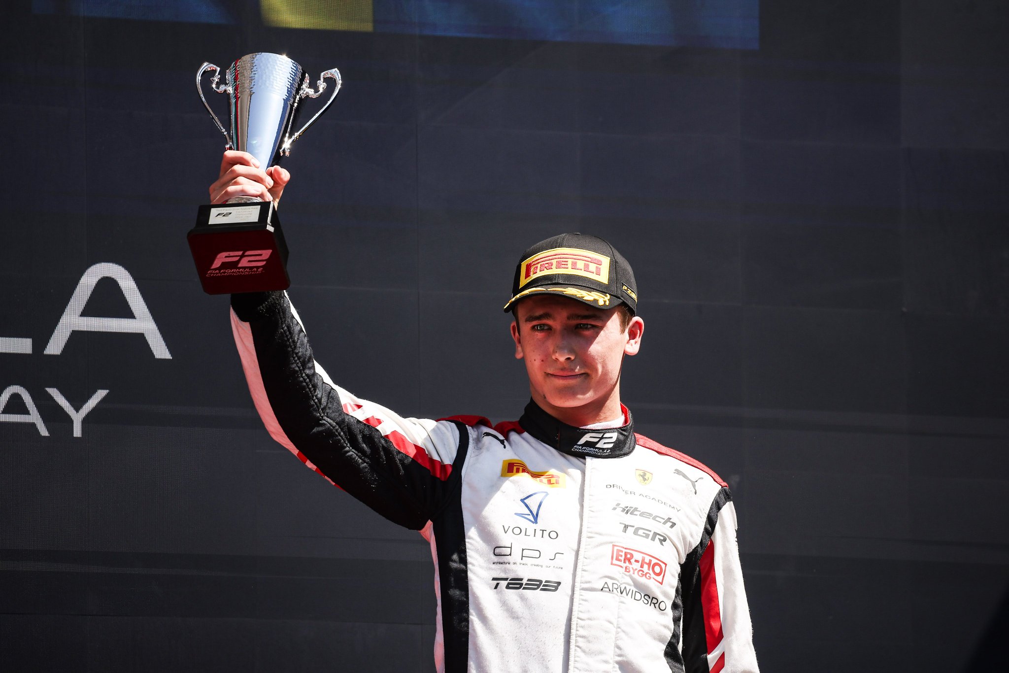 Hitech TGR's Dino Beganovic on the podium after P3 finish at the F2 Imola GP.
