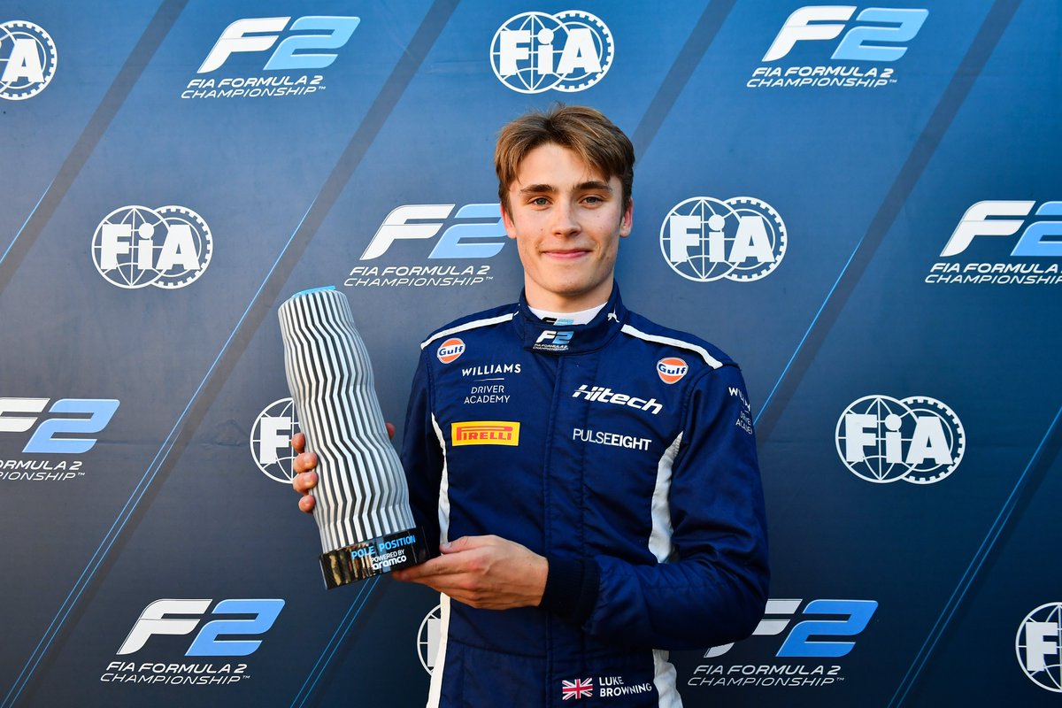 Hitech TGR's Luke Browning with his first pole-position trophy during F2 Qualifying at Monza.