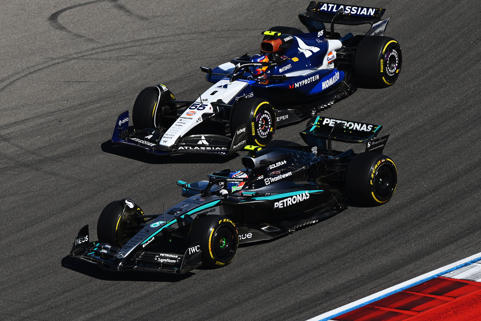 Williams driver Carlos Sainz and Mercedes driver Kimi Antonelli during the 2025 F1 US GP
