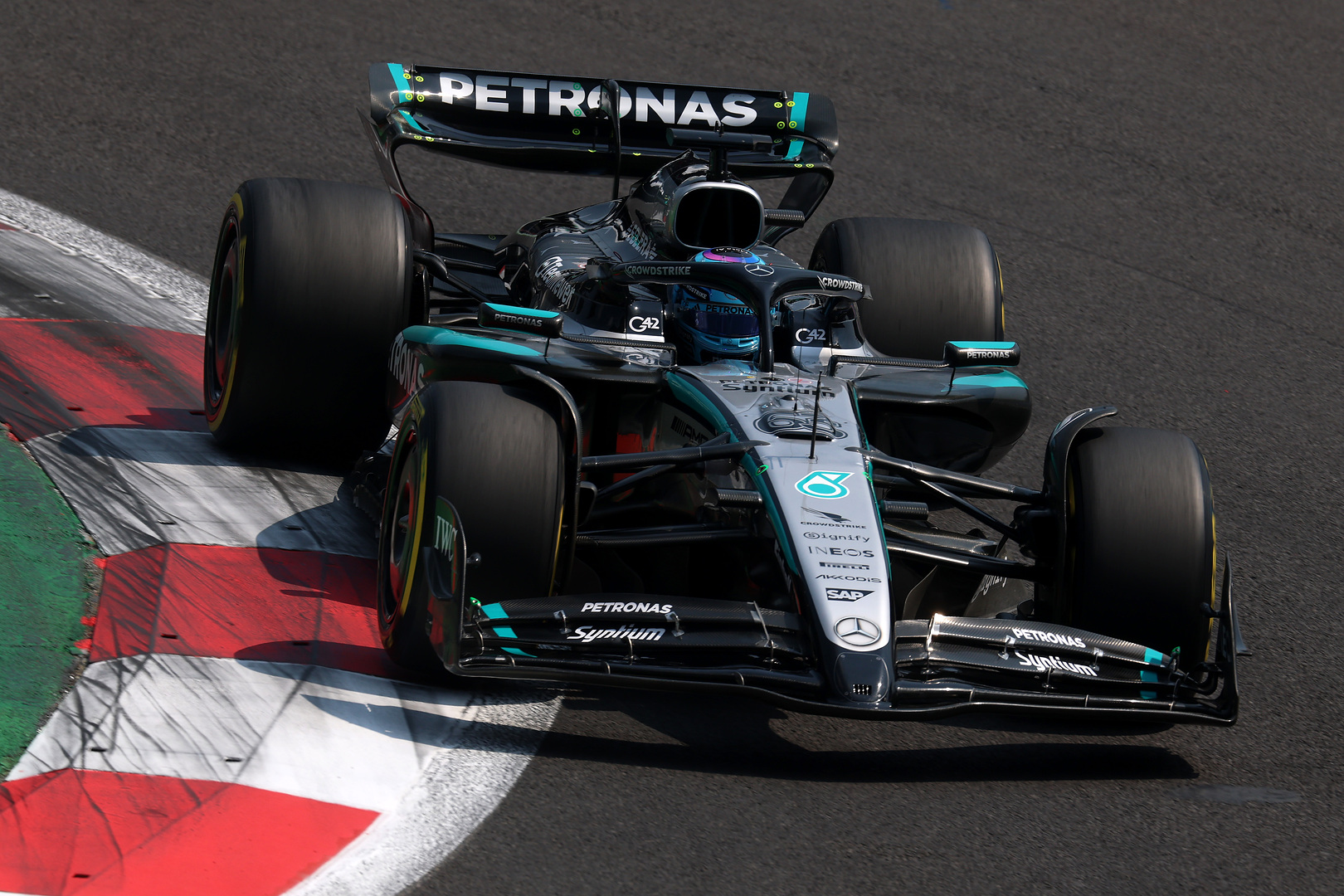 George Russell expressed satisfaction with his fourth-place grid position for the F1 Mexico City Grand Prix, acknowledging that Mercedes exceeded expectations despite lacking the outright pace of the leading trio.