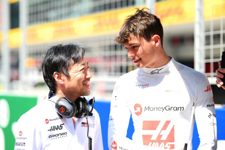 SHANGHAI, CHINA - MARCH 22: Ayao Komatsu, Team Principal of Haas F1 and Oliver Bearman of Great Britain and Haas F1 talk on the grid prior to the Sprint ahead of the F1 Grand Prix of China at Shanghai International Circuit on March 22, 2025 in Shanghai, China. (Photo by Simon Galloway/LAT Images)